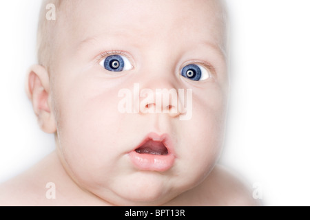 High key portrait of 10 week old baby boy. Stock Photo