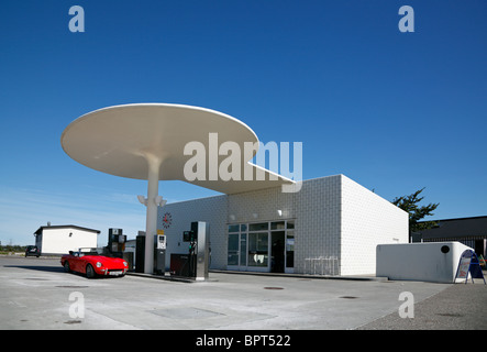 The petrol station on the coastal road at Skovshoved Harbour designed by modernist architecht Arne Jacobsen, just north of Copenhagen, Denmark Stock Photo