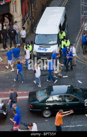Glasgow Rangers fans riot in Manchester with Police after UEFA cup ...
