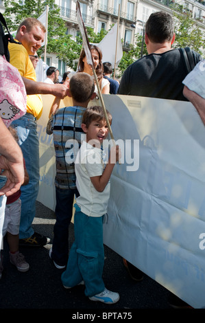 Paris, France, 'League of Rights of Man' protests Against discrimination to Expel Foreign Gypsies, Romas, Children Holding French Protest Poster on Street Stock Photo