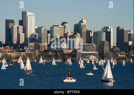 Retro image of Sailboat races on Lake Union with Seattle Skyline Seattle Washington State USA Stock Photo