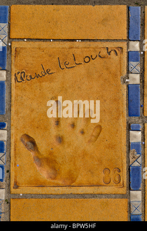 Clay handprint of French director Claude Lelouch outside the Palais des Festivals et des Congrès, Cannes Stock Photo