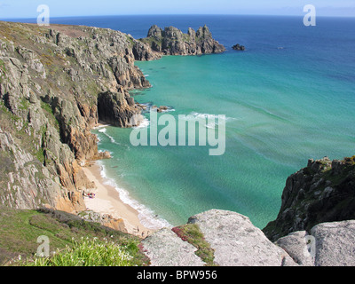 Pednvounder beach, Treen Cliff and Treryn Dinas headland site of the Logan Rock; near Porthcurno, Cornwall, UK Stock Photo