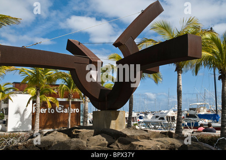 dh Puerto Calero harbour PUERTO CALERO LANZAROTE Marina waterfront fountain sculpture Stock Photo