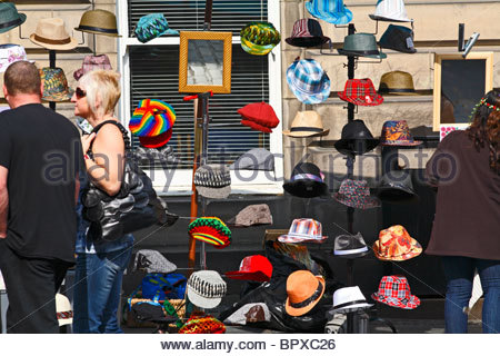 Hat stall in street market Stock Photo