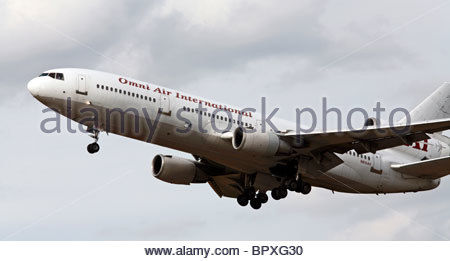 Omni Air International McDonnell Douglas DC-10 shortly after takeoff Stock Photo