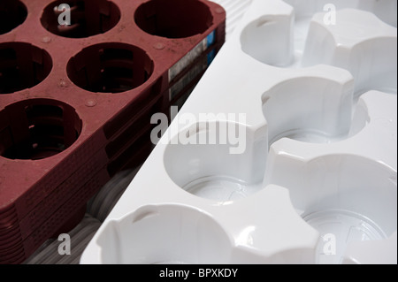 Plastic containers for flower pots in brown and white Stock Photo