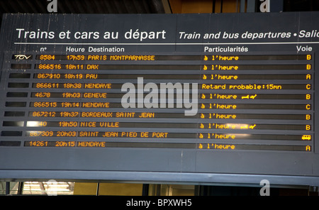 Departures board in French railway station Stock Photo