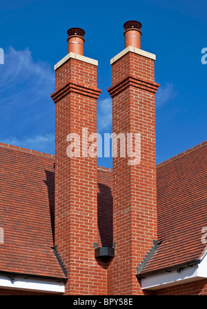 Double chimney on a house in Chigwell, Essex. Stock Photo