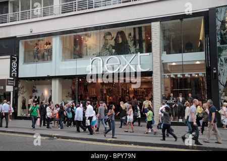 Street view of the NEXT clothing and fashion store on Oxford Street, London, UK. Stock Photo