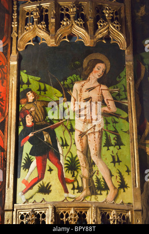 Segovia, Spain. Detail of a 15th century Castilian School altarpiece on display in the Alcazar showing St. Sebastian. Stock Photo