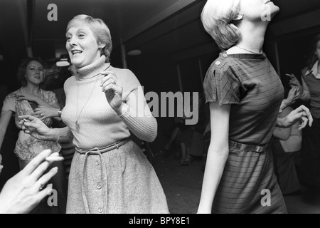 Hen Party 1970s London UK. Middle aged women dancing smoking together at a private womens only night hen do. England  70s 1979 HOMER SYKES Stock Photo