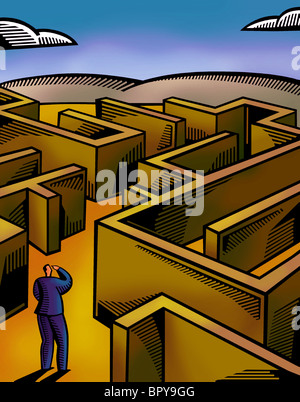 A businessman walking through a maze Stock Photo