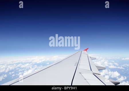 Airplane Wing in Flight Stock Photo