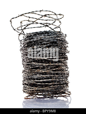 coiled barbed wire on a white background. Stock Photo