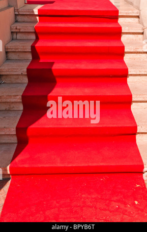 Red Carpet leading up steps at a movie award ceremony Stock Photo