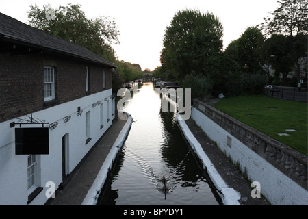 Moored houseboats and barges adorn the banks of the Grand Union Canal at Little Venice in London`s Maida Vale district. Stock Photo