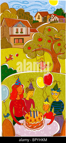 A family having a birthday celebration in the backyard Stock Photo