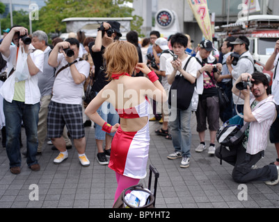 Photographers and cosplay girl at Anime / Manga convention in Odaiba, Tokyo Stock Photo