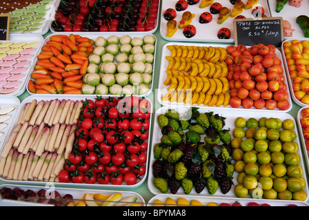 Marzipan sweets (candies) made to look like vegetables and fruits. Market stall. Nice. Cote d'Azur. France Stock Photo