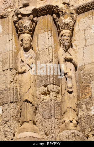 Segovia, Segovia Province, Spain. Iglesia de San Martin. Carved stone figures beside door of Romanesque church of St. Martin. Stock Photo