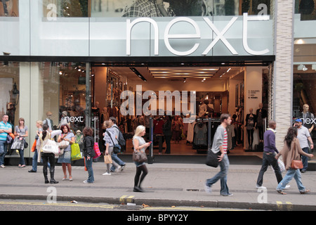 Street view of the NEXT clothing and fashion store on Oxford Street, London, UK. Stock Photo