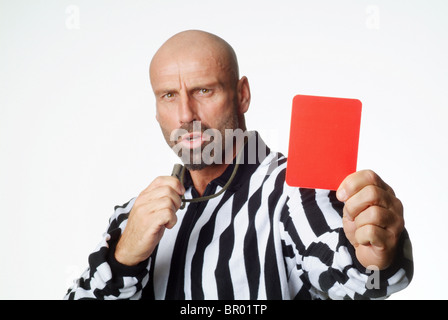 A soccer referee showing a red card Stock Photo