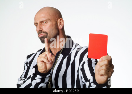 A soccer referee showing a red card Stock Photo