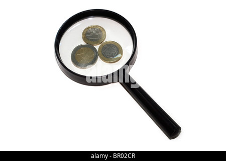 Euros under a magnifying glass Stock Photo