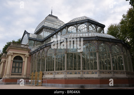 Crystal palace with cloudy skies in Madrid, Spain Stock Photo