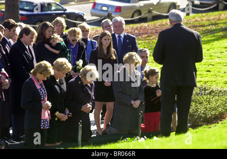 Members of the  Kennedy family visit John Kennedy's grave site at Arlington National Cemetery. Stock Photo