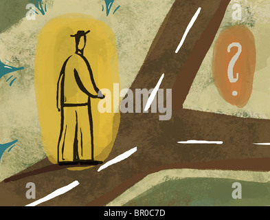 A man standing at a crossroads Stock Photo