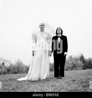 dressing couple cross wedding alamy