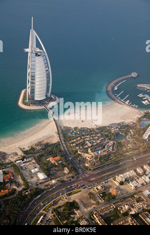 UAE, Dubai. Aerial image of Burj al Arab Hotel and Wild Wadi Water Park on Jumeirah Beach. Stock Photo