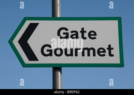 A road sign pointing to a Gate Gourmet (airline caterer) plant, near Heathrow Airport, London, UK. Stock Photo