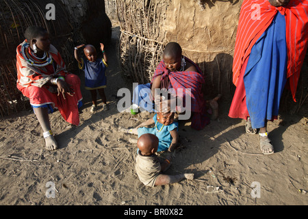 Maasai family in a village, Ngogongoro conservation Area, Tanzania Stock Photo