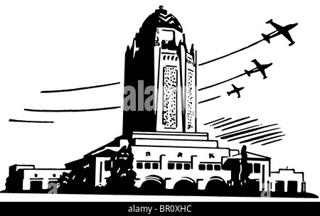 A black and white version of a large art deco type building with planes flying in the background Stock Photo