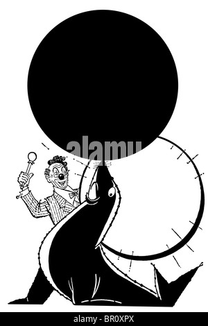 A black and white version of a clown training a seal to balance a ball on his nose Stock Photo