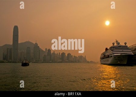 Sunset over Financial District seen from Kowloon Hong Kong Stock Photo