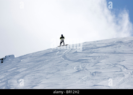 Young man snow boarding  at Kirkwood, California. Stock Photo