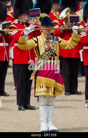 A Drum Major from the Coldstream Guards marches to the Trooping the