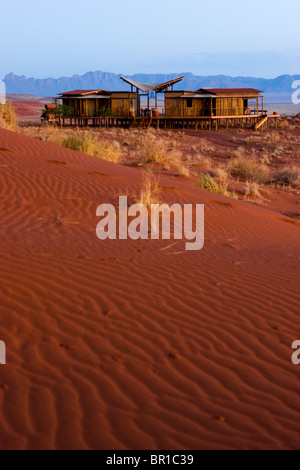 Wolwedans Mountain View Suite in the morning light perched on the dunes of the Namib Rand Nature Reserve, Namibia. Stock Photo