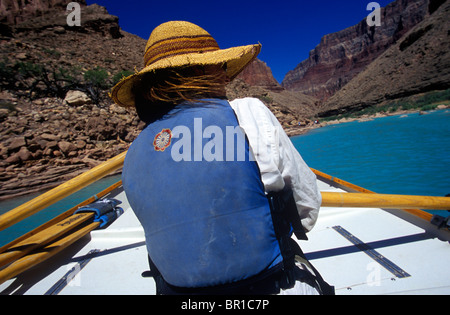 River guide rowing a wooden dory, Grand Canyon National Park, Arizona. Stock Photo