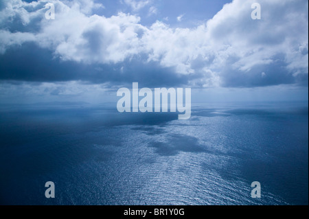 Australia, Queensland, Whitsunday Coast, Whitsunday Islands. Aerial View of clouds above the Whitsunday Islands. Stock Photo