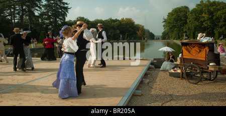 France - senior people activities, French Adults Couples at Traditional Dance, "Chateau de Breteuil", Choisel,  Dressed in Period Costume, Fancy Vintage Dress, group dancing outdoors people, seniors grown ups, historic holiday ballroom dancing Stock Photo