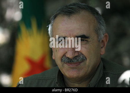 Murat Karayilan also nicknamed Cemal the Kurdish guerrilla and current commander-in-chief of the People's Defence Forces HPG the military wing of the Kurdistan Workers' Party PKK during interview in the Qandil Mountains are a mountainous area of Kurdistan Region near the Iraq-Iran border. Stock Photo