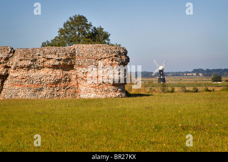 Berney Arms Drainage Mill seen from the Roman fort Burgh Castle, Norfolk Stock Photo