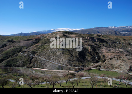 View of the countryside and Sierra Nevada mountains, near Cadiar, Las Alpujarras, Granada Province, Andalucia, Spain, Europe. Stock Photo