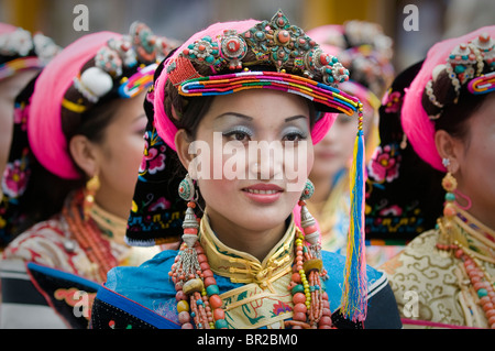 Ethnic Tibetan performer wears traditional costume at dance and folk festival, Danba, Sichuan Province, China Stock Photo