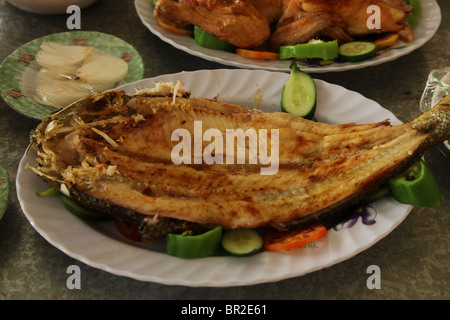 Fried fish served in a restaurant. Northern Iraq Stock Photo